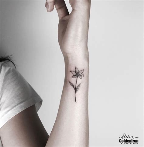 tiny lily tattoo|lily tattoo art.